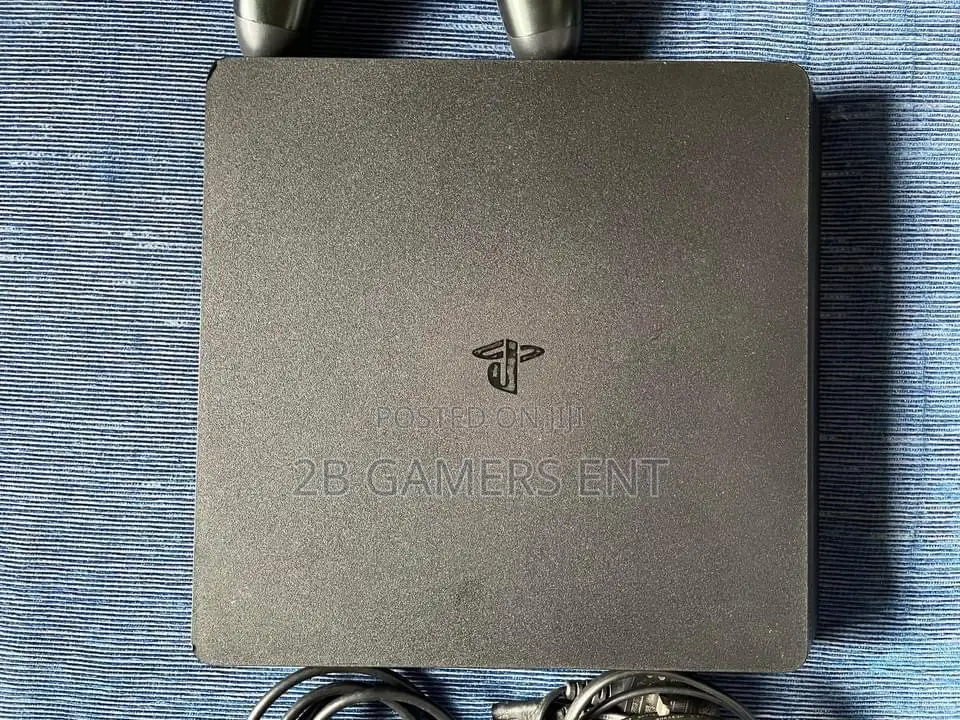 Play Station 4 Slim, Home Used, Slightly
