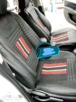 5 Seater Car Fitted With Black Seat Cushion With Red Stitche
