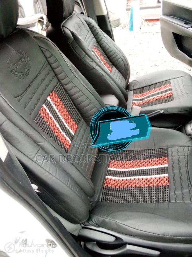 5 Seater Car Fitted With Black Seat Cushion With Red Stitche
