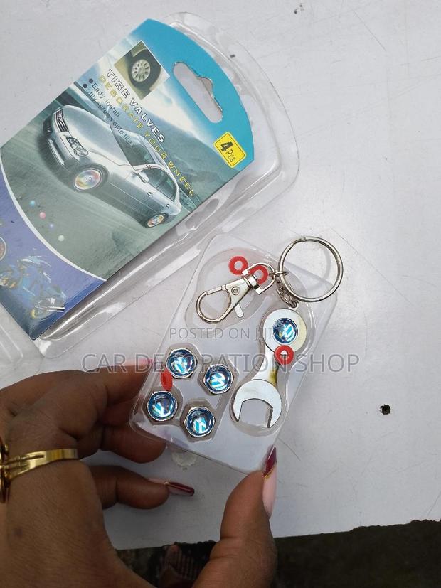 Universal 4pc Volkswagen Silver Wheel Nozzle Covers - main view