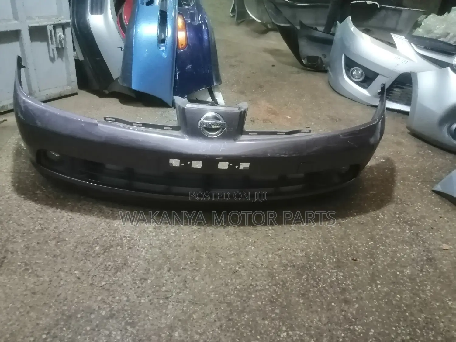 Nissan Tiida 2005/2007 Front Bumper With Fog Lamps, EX Japan