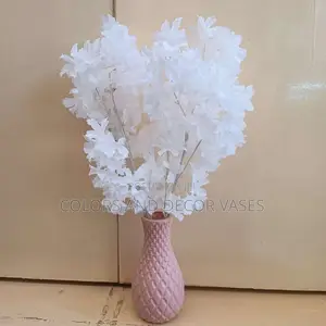 Blossom Flowers With Plastic Vase