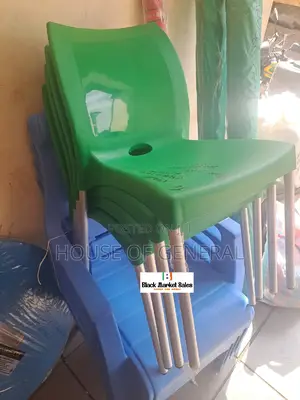 Armless Green Plastic Chair With Metal Tubing Legs
