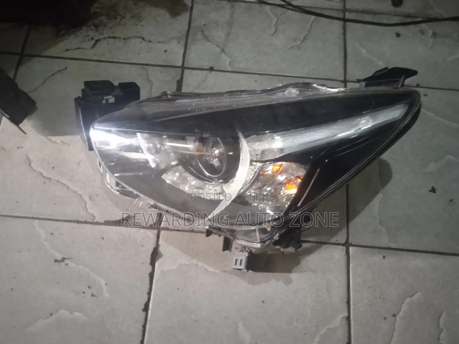 Demio Headlight