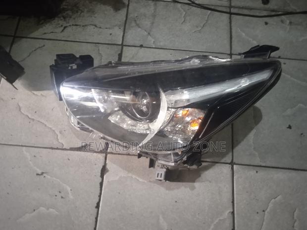 Demio Headlight