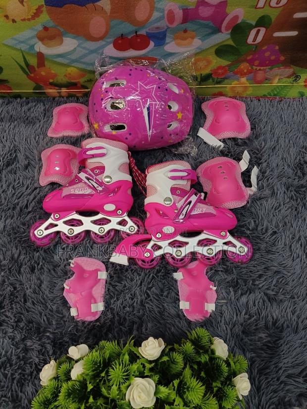 Pink Roller Skates /Rollers Skaters