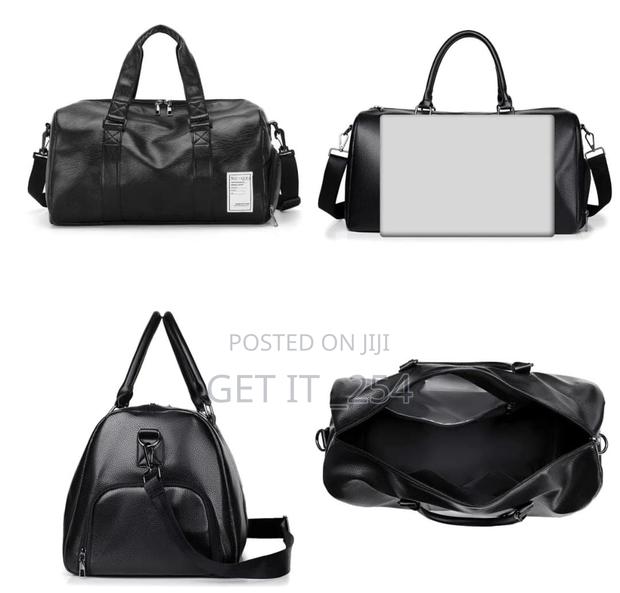 *Leather Duffle Bag*
*Material:Leather*
*Colors:Black - thumbnail 2