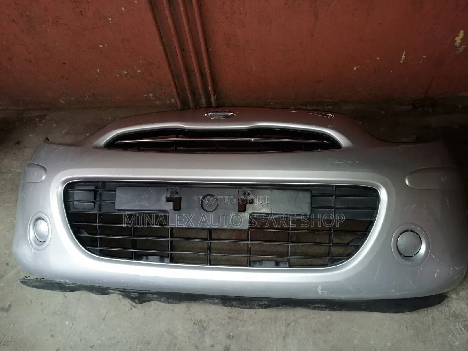 Silver Nissan March Front Bumper