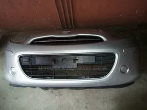 Silver Nissan March Front Bumper