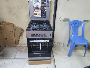 Mika Cooker Electric Oven With Four Burner Standing Cooker.
