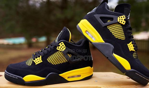 Quality Thurder Yellow Jordan 4s - main view