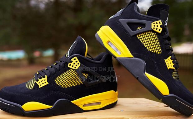 Quality Thurder Yellow Jordan 4s - thumbnail 3