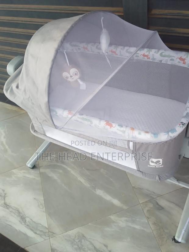 Affordable Co Sleeper, Electric With Music. - main view