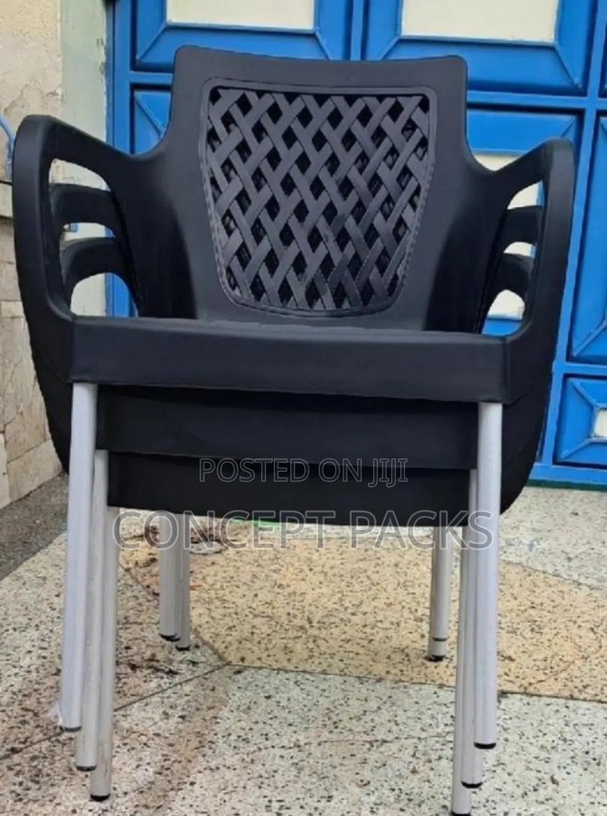 Black Oshwal Strong Metallic Legs Plastic Chair With Arms.