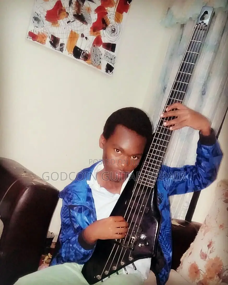 Guitar Teacher/Guitar Tutour
