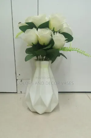 White Vase And White Flowers