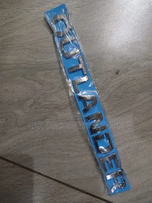 Outlander Front Grill Lettering Bonnet Badge