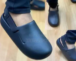 The Nike Calm Mules