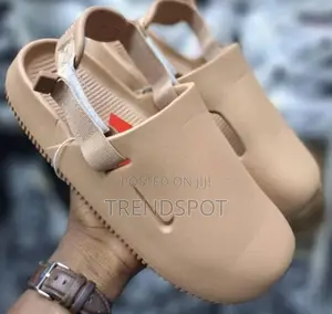 The Nike Calm Mules
