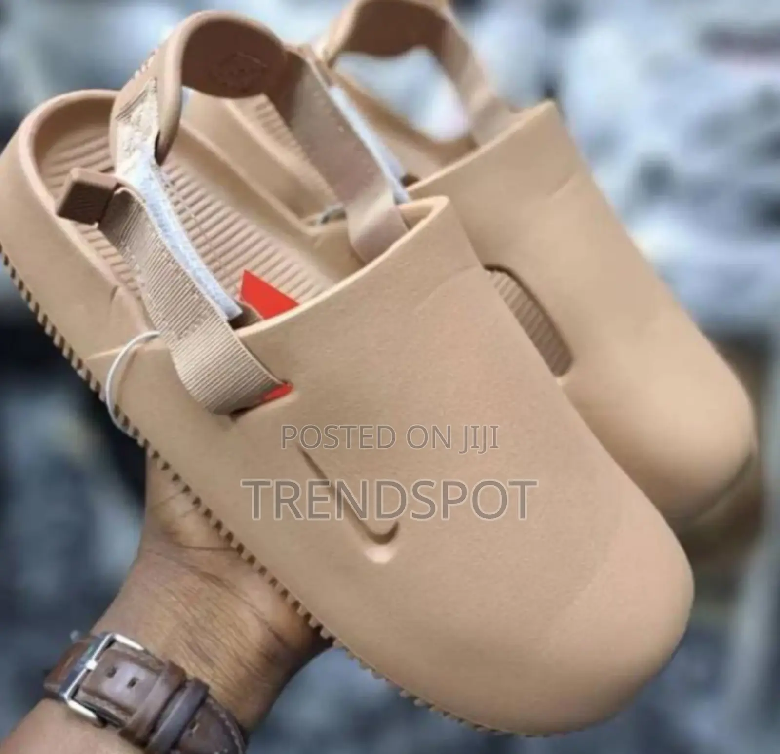 The Nike Calm Mules