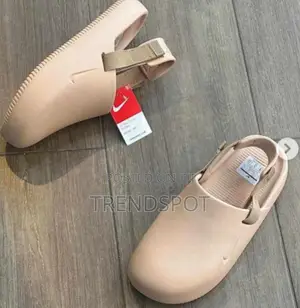 The Nike Calm Mules