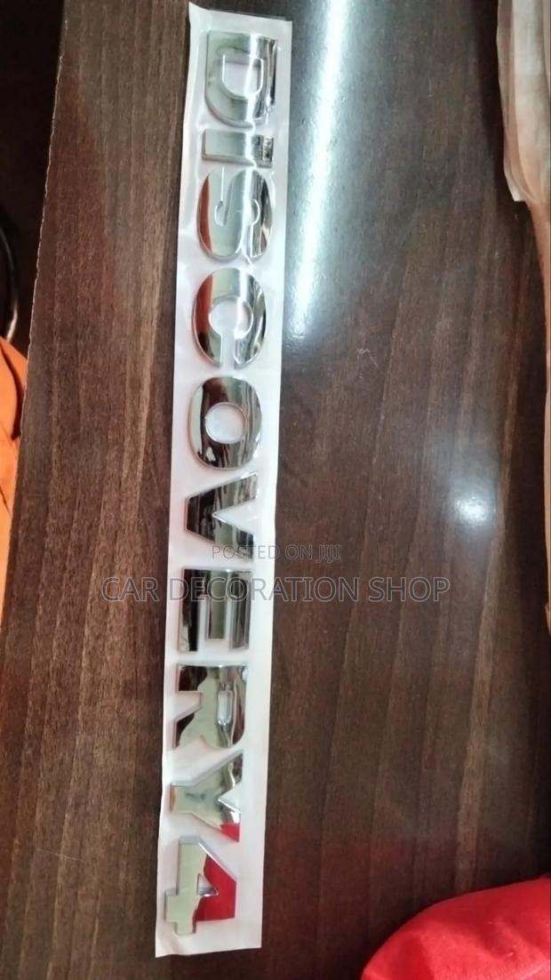 DISCOVERY4 Silver Boot Badge