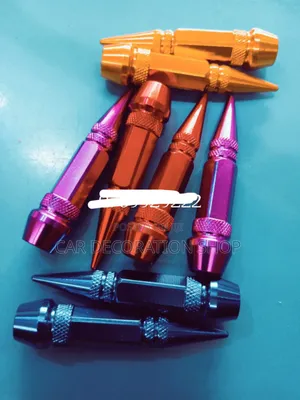Different Colors 4pc Bullet Shaped Tire Valve Caps Nuts