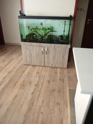 Aquarium With Cabinet and Unique Fish