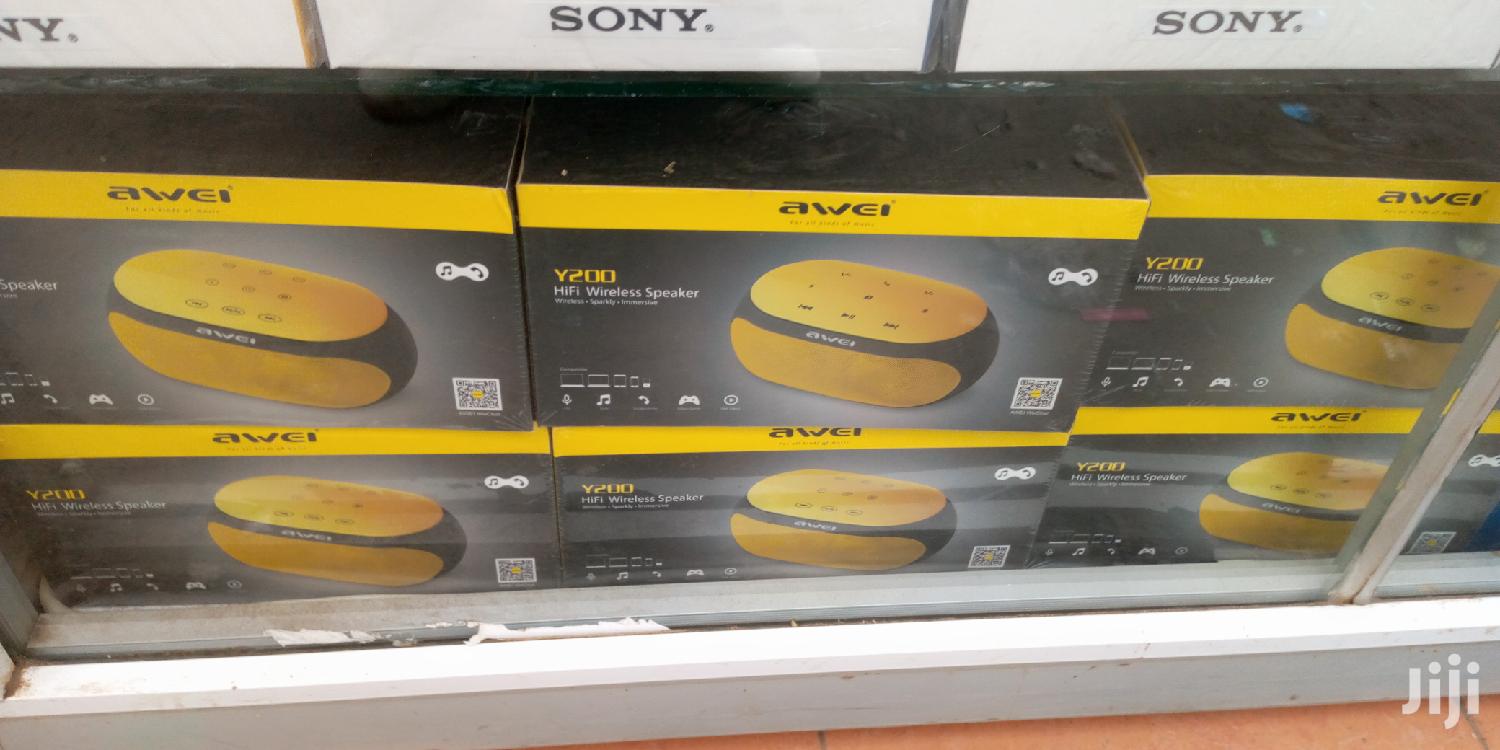 Awei Yellow And White Bluetooth Speaker.