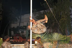 The Famous Acrobatic Brothers Pole Climbing Group.
