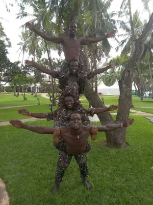 The Famous Acrobatic Brothers Pole Climbing Group.