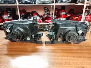 Pajero Mini 2003 Clear Headlights Complete With Bulbs