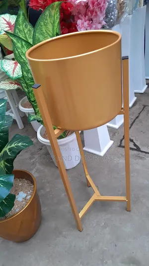 Golden Metal Vase and Stand Available on Order