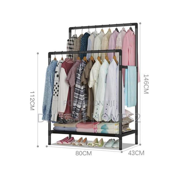 Double Pole Clothing Rack With Lower Storage Shelf - main view