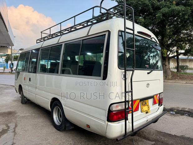 Toyota Coaster 2015 White - thumbnail 2