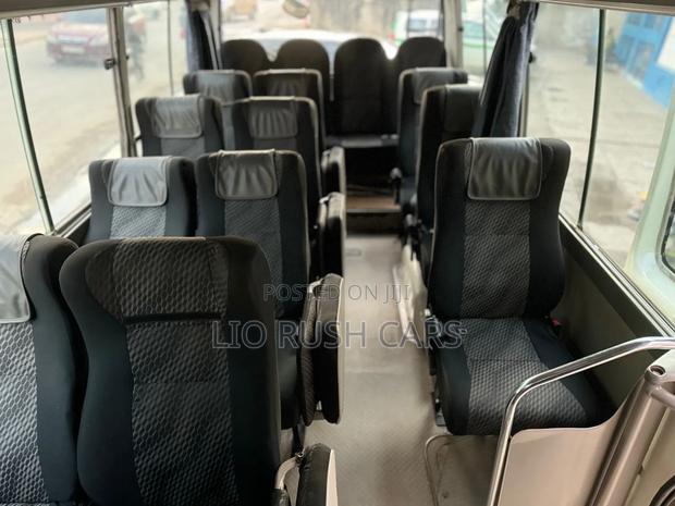 Toyota Coaster 2015 White - thumbnail 3