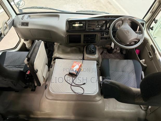 Toyota Coaster 2015 White - thumbnail 4