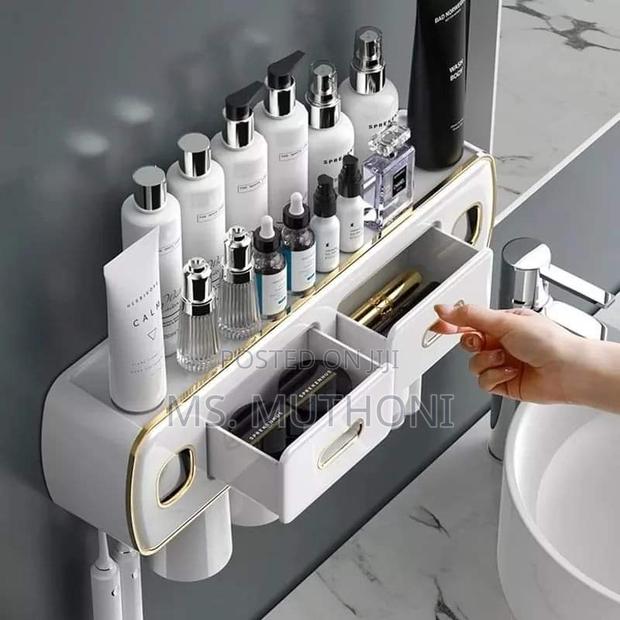 Wall Mounted Self-Adhesive Toothpaste With Toothbrush Holder - thumbnail 2