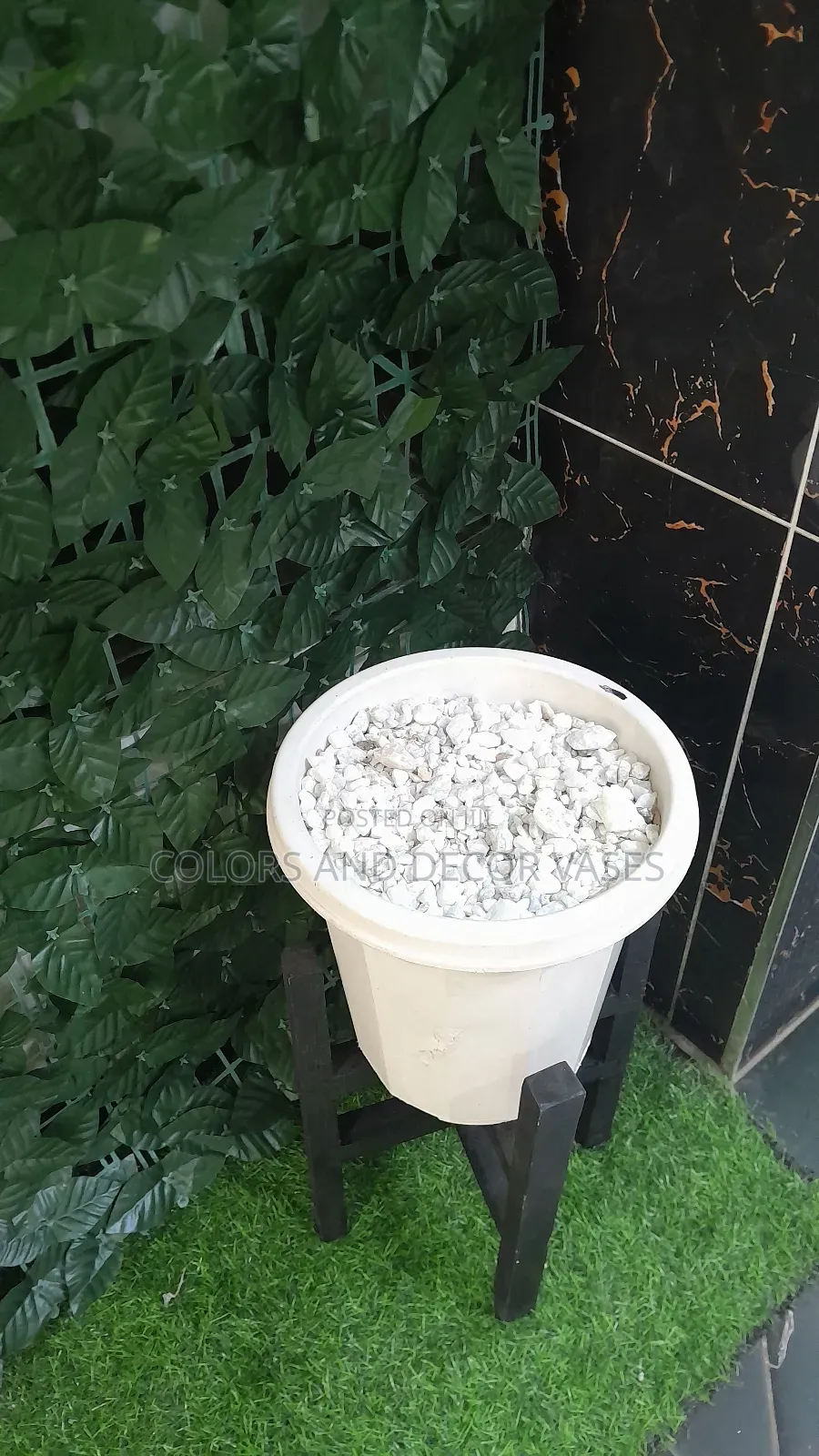 Plastic Vase With Pebble Stones and Stand