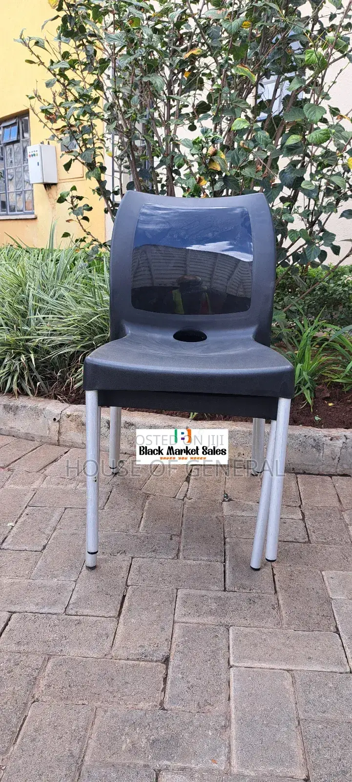 Black Armless Plastic Chair With Metal Legs