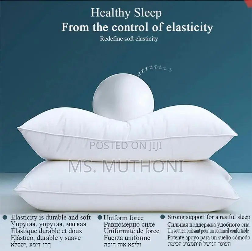 A Pair (2) Compressed Fibre Pillows