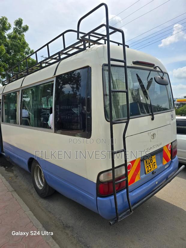 Toyota Coaster 2015 White - thumbnail 2