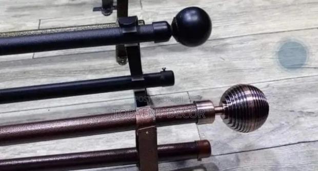 Brown and Black Window Adjustable Curtain Rods