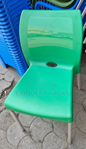 Safaricom Green Armless Chairs With Metal Tubing.