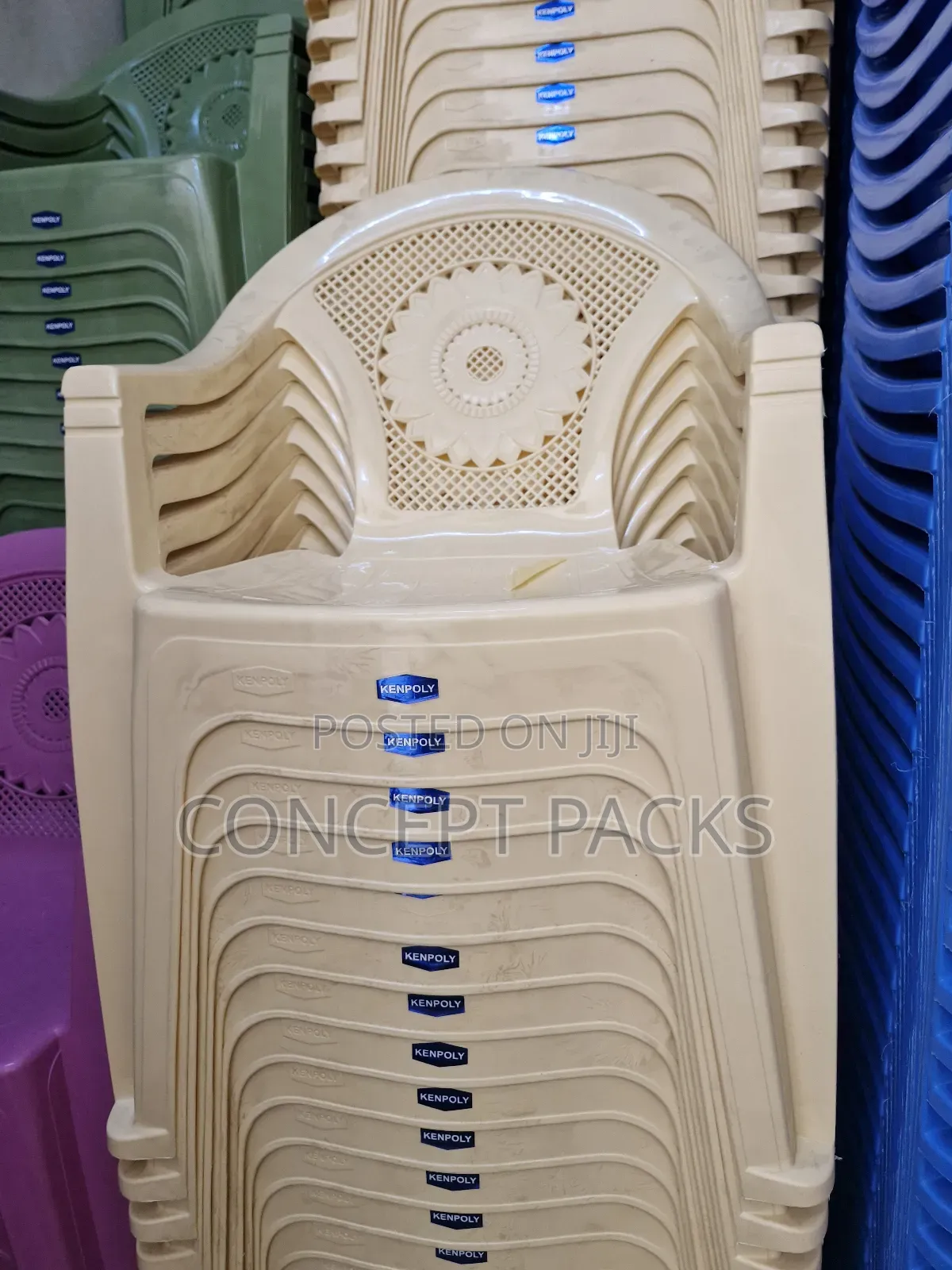 Cream Kenpoly Plastic Chairs With Arms.