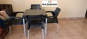 5 Set of Plastic Chair and Table With Metal Tubing Legs