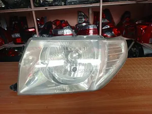 Ex-Japan Pajero IO LHS Headlight (Clear)