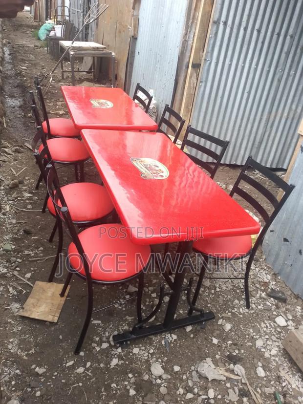 Hotel Set of Flat Chairs, Red With a 4 by 2 Table.