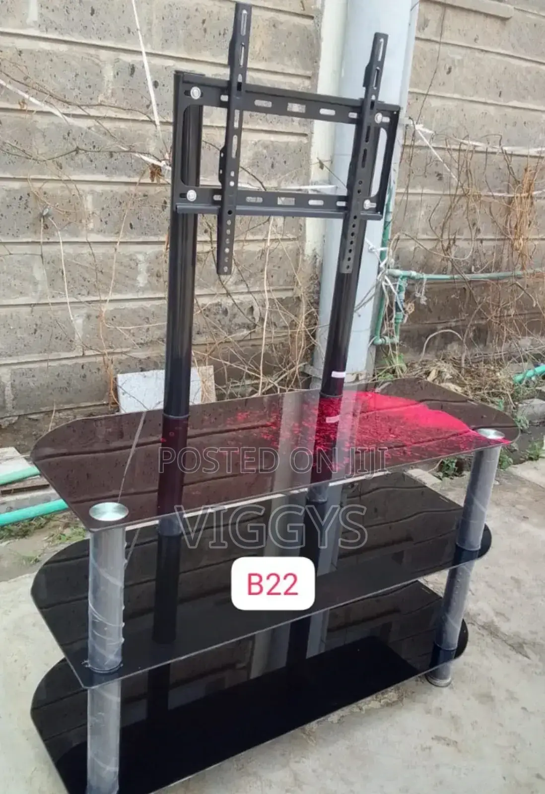 Excellent Black Executive Glass Tv Stand With Wall Mount