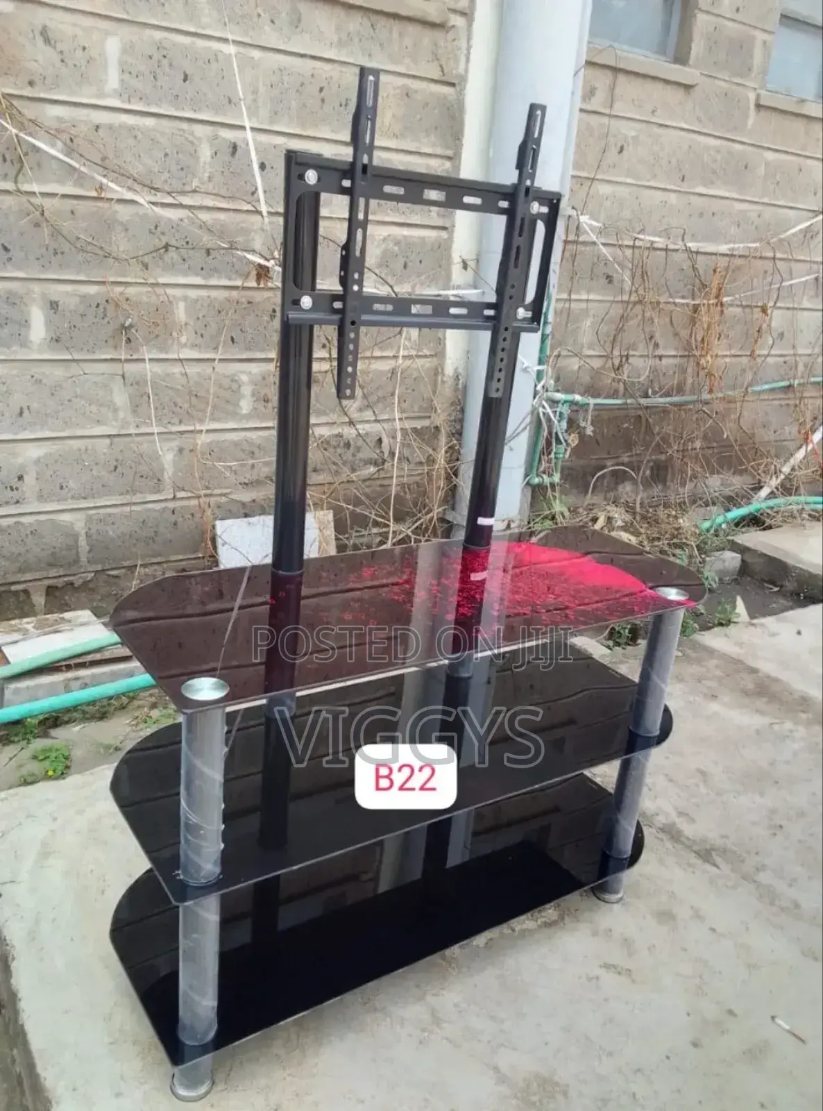 - Cool Black Executive Glass Tv Stand With Wall Mount